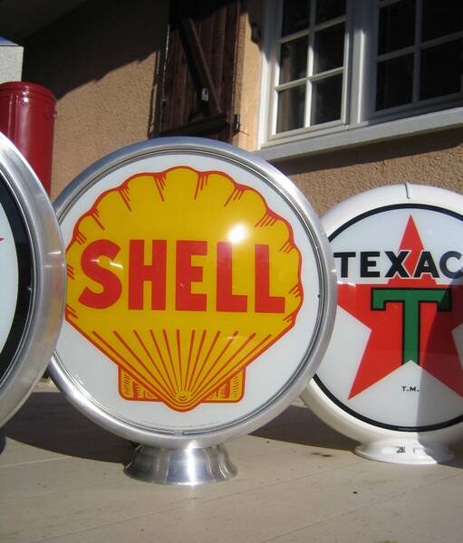 Globe Shell avec coquillage jaune et cerclage métallique