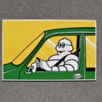 Plaque publicitaire vintage des années 1970 avec le Bibendum Michelin