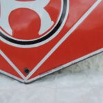 Plaque émaillée HUILES RENAULT "EN VENTE ICI" (© rouleetvintage.net)