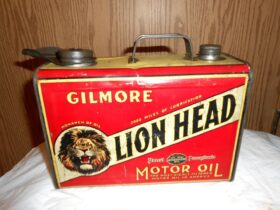 Bidon d'huile moteur Gilmore Lion Head vintage, 1 gallon, (© worthpoint.com)