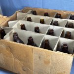 ÉTUI ANTIQUE BOUTEILLES D'HUILE MOTEUR PENNZOIL (17) POTS EN VERRE AMBRE PAPIER - QUELQUES ÉTIQUETTES (© ebay.com)