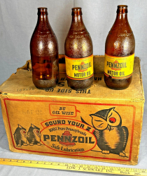 ÉTUI ANTIQUE BOUTEILLES D'HUILE MOTEUR PENNZOIL (17) POTS EN VERRE AMBRE PAPIER - QUELQUES ÉTIQUETTES (© ebay.com)