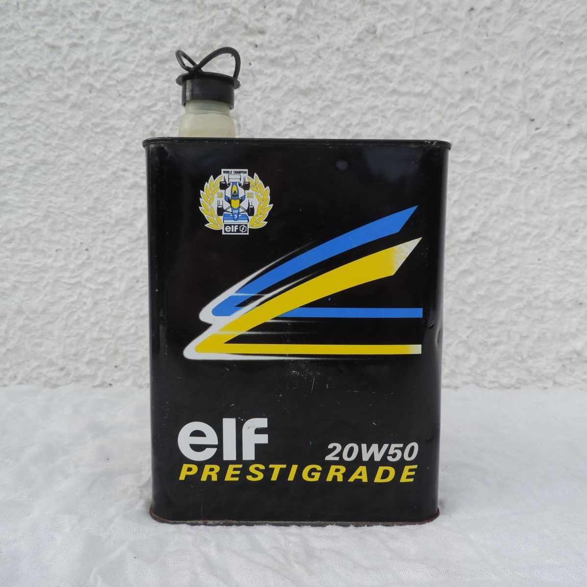 Bidon ELF PRESTIGRADE 20W50 (1992) (© rouleetvintage.net)